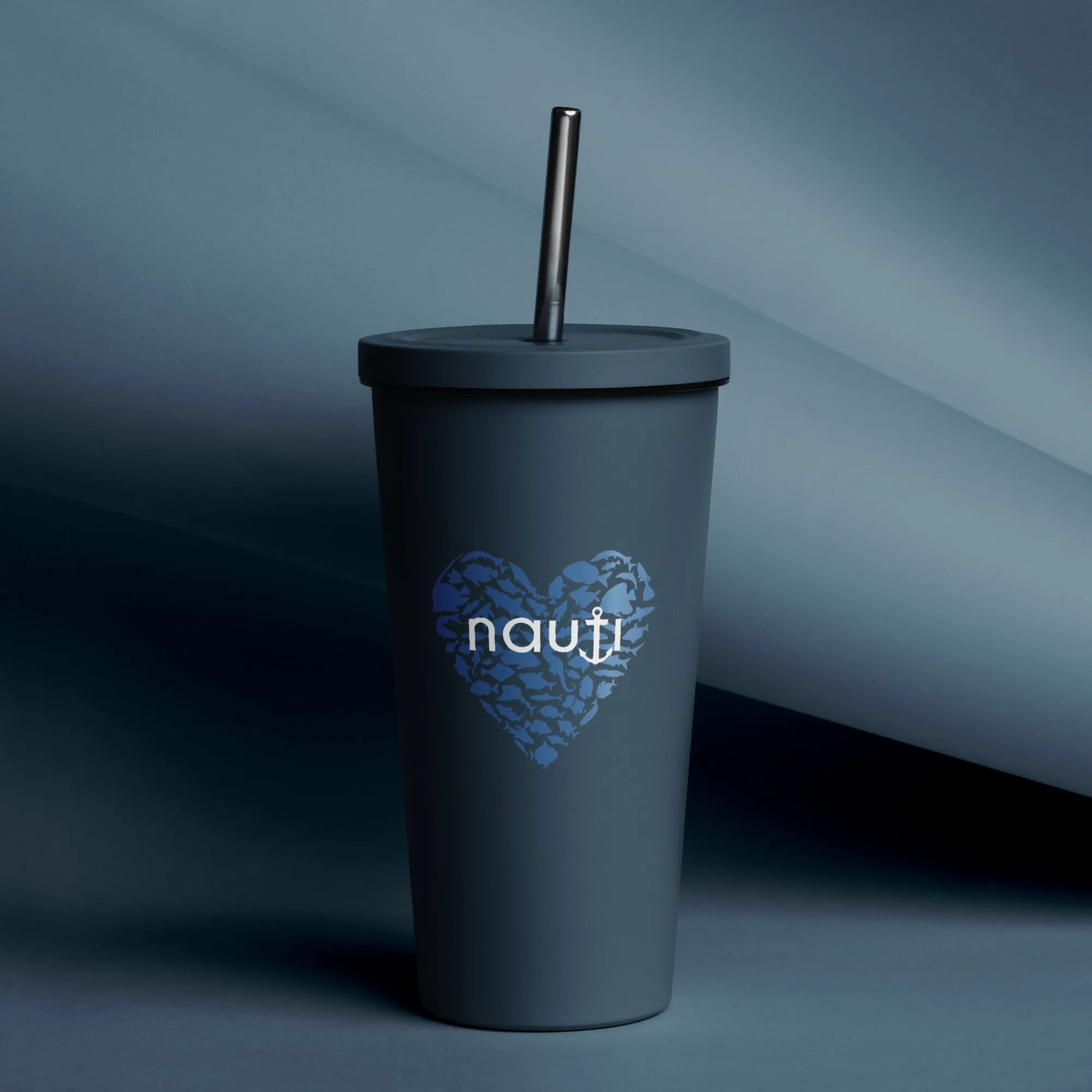 20 oz. Insulated tumbler with a straw in navy with blue fish heart and white NAUTI logo